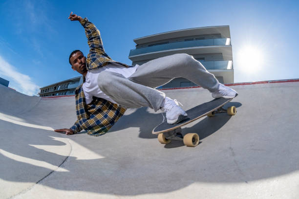 istock Surf skater performing a agressive slide on a skatepark 1488707600