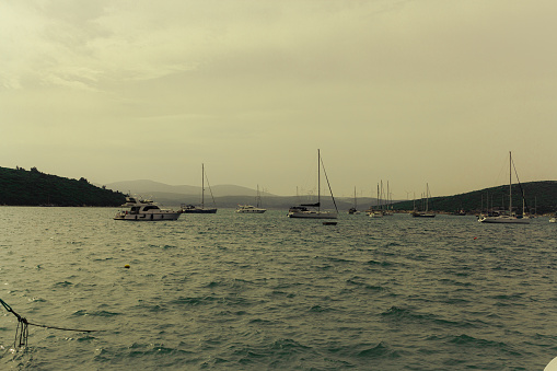 Aerial view of bay with boats, background with copy space, full frame horizontal composition,