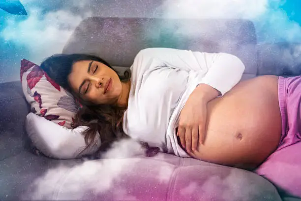 Pregnant beautiful woman, sound asleep and dreaming, photomanipulation