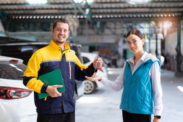 istock Vehicle technician talking with female customer. 1488710961
