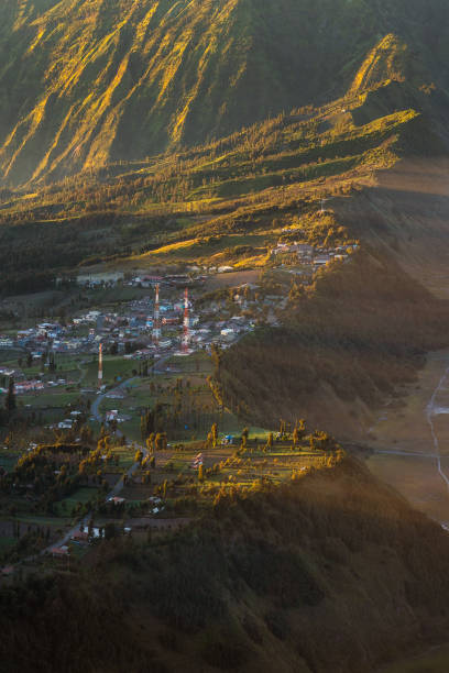 istock Small town on the hill with sunlight. 1488722500