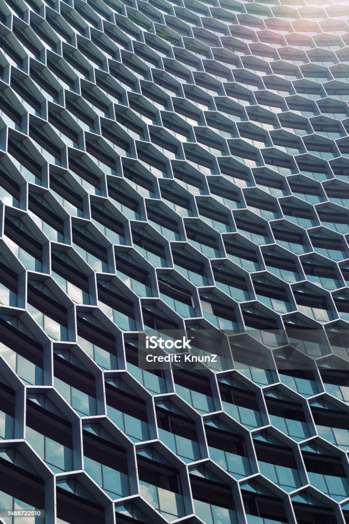 Facade of the office building was designed in beehive. One of the office building in Singapore was designed the facade in beehive shape. Beehive Stock Photo