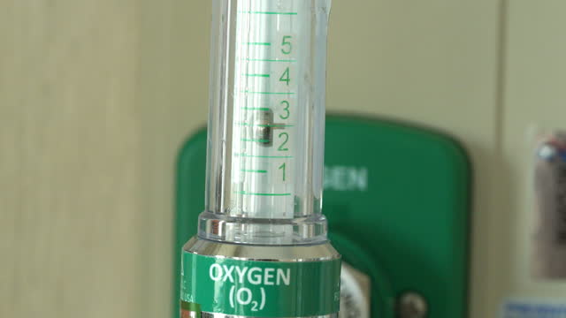 Oxygen cylinder pressure regulator for patients to use for treatment.