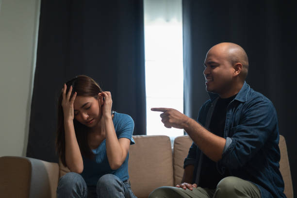 istock Relationships problems conflicts in marriage. Depressed stressed violence young couple man and woman Argument fighting shouting in the house. Making decision of breaking up get divorced. Harassment 1488731812