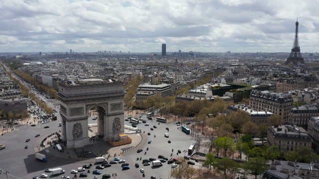 Aerial view of Arc de Triomphe with skyline of Paris and famous Champs Elysees street,  France