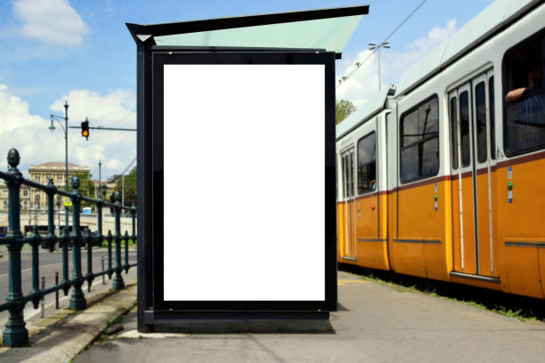 istock bus shelter with lightbox. blank white billboard ad panel at bus stop. background for mockup 1488736379