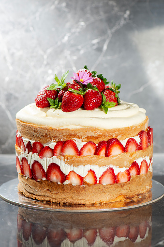 Victoria Sponge Cake with delicious Chantilly cream and fresh strawberries