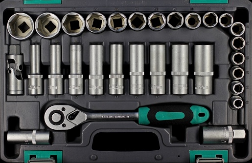 a set of socket wrenches and adapters of different diameters