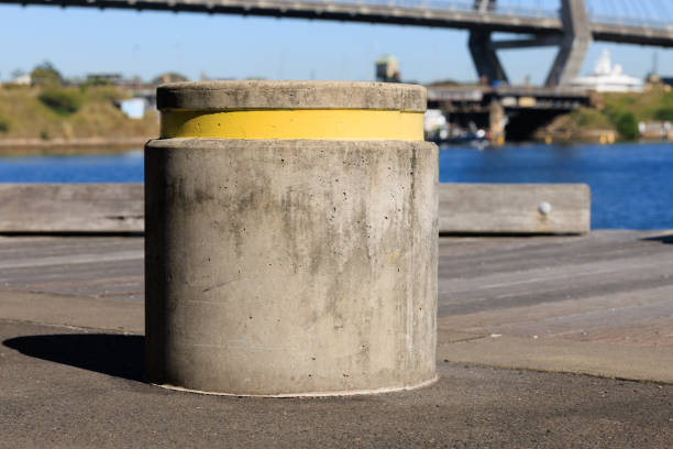 istock Concrete mooring post on a seaside pier 1488752445