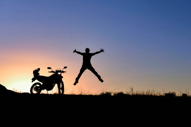 the energetic nature of the motorcycle adventurer stock photo