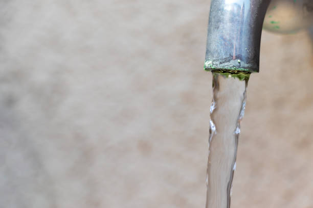 istock Water flowing from a metal tap 1488763566