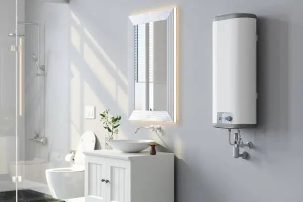 Photo of Close-up View Of Water Heater, Mirror And White Cabinet In Modern Bathroom