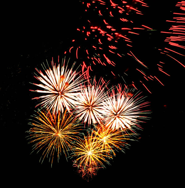 istock Multiple fireworks against the deep black sky. Bright  display of the fireworks 1488770259