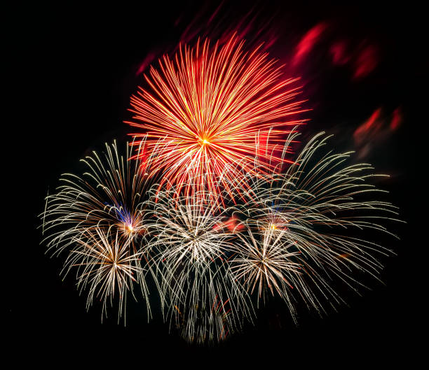 istock Multiple fireworks against the deep black sky. Bright  display of the fireworks 1488770368
