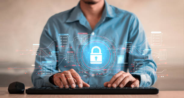 istock Businessman working on laptop with virtual screen. Online documentation database, IT consultant being set up Virtual Document Management System with a laptop, Software for archiving corporate files. 1488773494