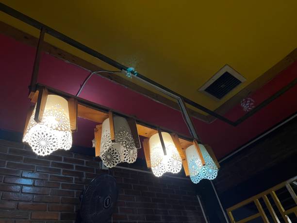 istock Hanging lamp on the ceiling in the restaurant. 1488773827