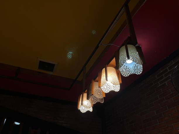 istock Hanging lamp on the ceiling in the restaurant. 1488774259