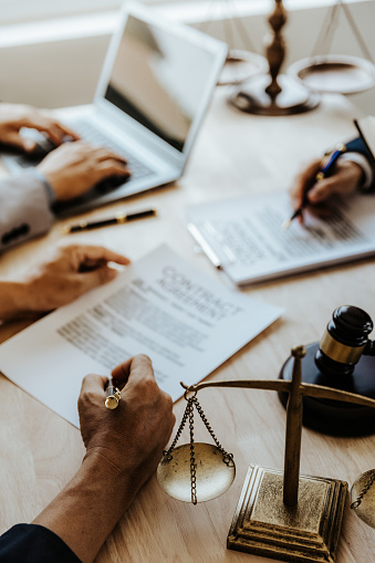 Businessmen and lawyers discuss contract documents. sign a business contract.