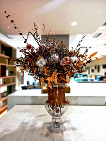 Dried flowers in a vase.