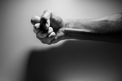 Black and white photo of wrinkled hands of senior generation