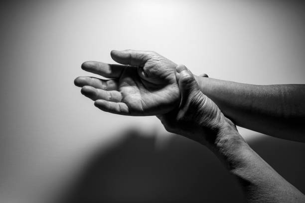 Black and white photo of wrinkled hands of senior generation