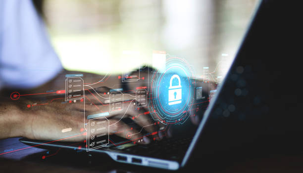 istock Businessman working on laptop with virtual screen. Online documentation database, IT consultant being set up Virtual Document Management System with a laptop, Software for archiving corporate files. 1488780925