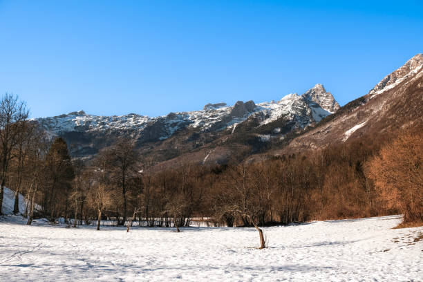 As you're driving around a mountain range, the sky clears up and it's a beautiful sunny day