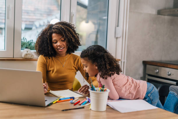 istock mother and daughter at home 1488789260