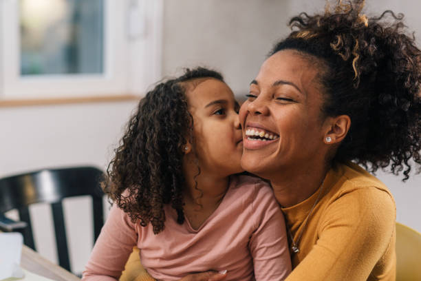 istock mother and daughter at home 1488789339