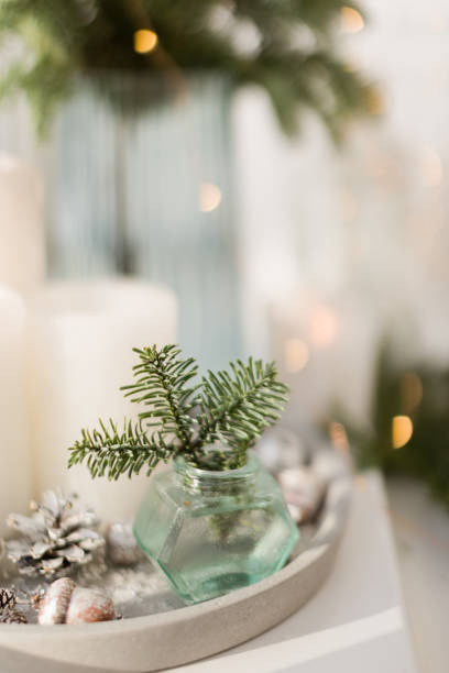 istock Bouquet of spruce and burning candles 1488797090