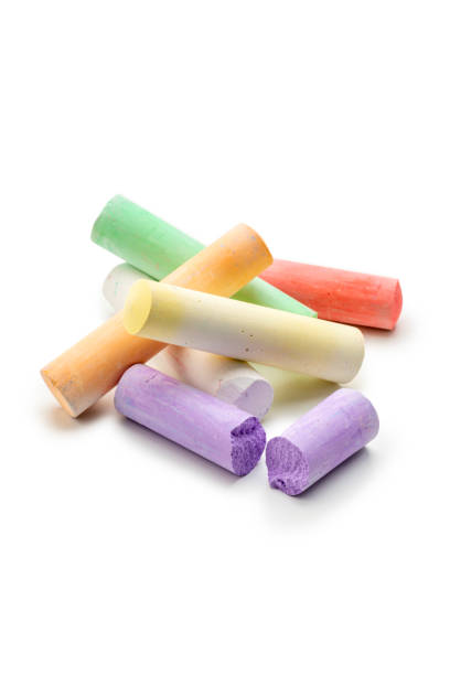 istock Concept kids: Pieces of colored chalk on a white background 1488800445