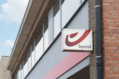 Hasselt. Limburg - Belgium 20-12-2021. B Post - facade of the building of the Belgian Postal Service. B-Post Logo