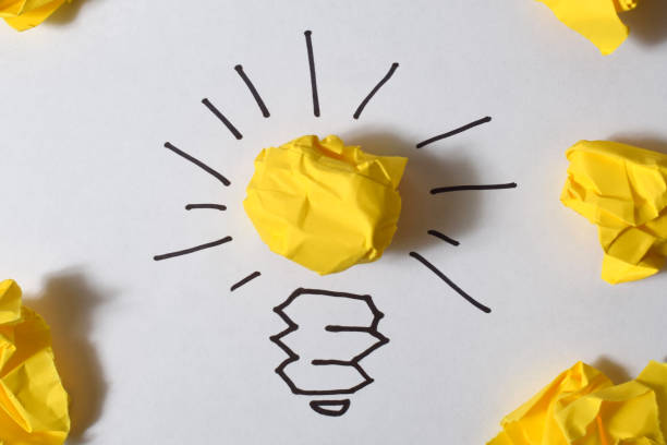 istock concept crumpled paper light bulb metaphor for good idea 1488804038