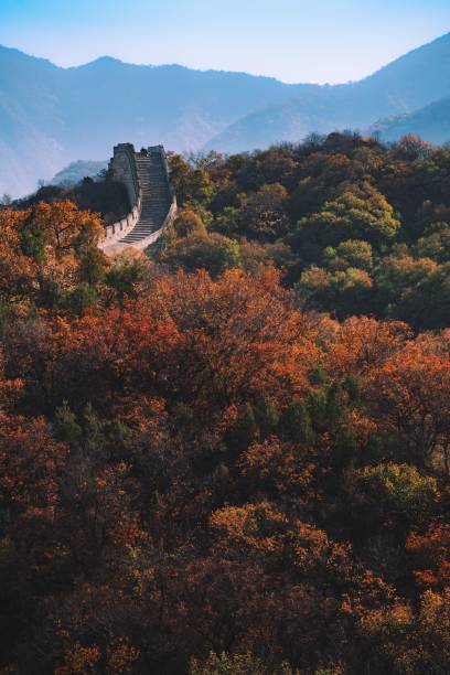 istock a hill with a very long fence next to some mountains 1488804851
