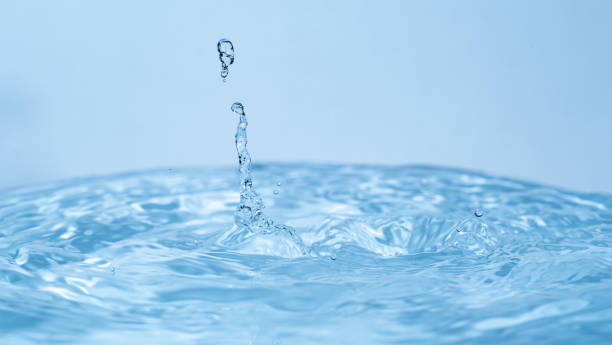 Free Stock Photo of A water droplet splashing into water | Download ...