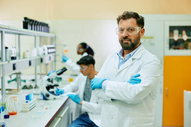 istock Portrait of confident scientist in laboratory looking at camera. 1488815962