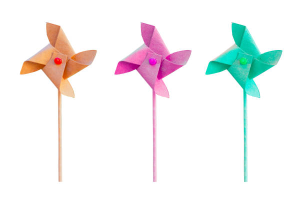 A set og three pinwheel on brown craft paper on blurred background. with clipping path.