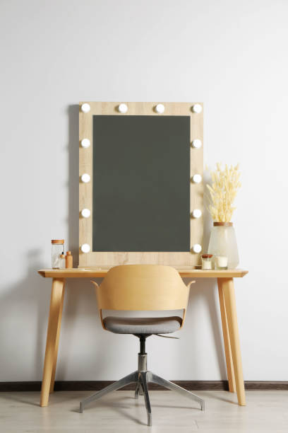 istock Dressing table with stylish mirror, dried reeds and other decorative elements. Interior design 1488823028