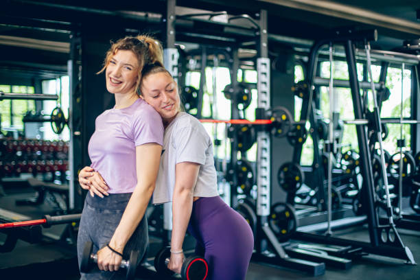 istock Two young women talking in the gym 1488825220