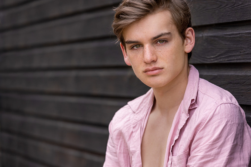 Handsome teenager teen male boy teen young adult outdoor portrait