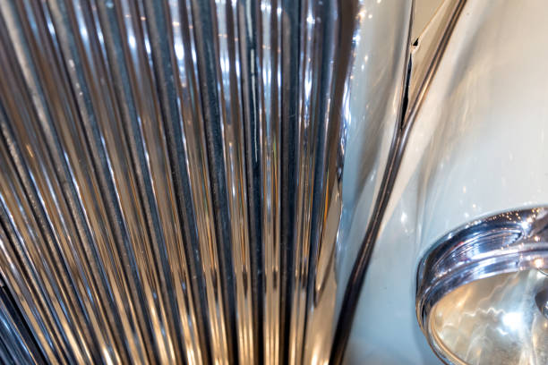 radiator grille and headlight of retro car close up