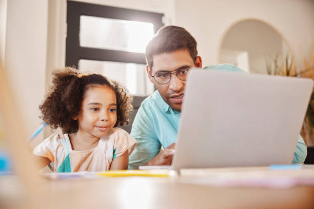 istock Elearning, father and daughter with laptop for education bonding or homeschooling work together. Diversity, Indian dad or girl child searching for online study info or pc knowledge on digital website 1488834074