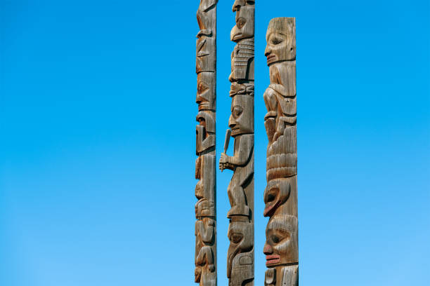 Totem Poles, British Columbia, Canada Totem poles of Gitanyow or Kitwancool in British Columbia. smithers british columbia stock pictures, royalty-free photos & images