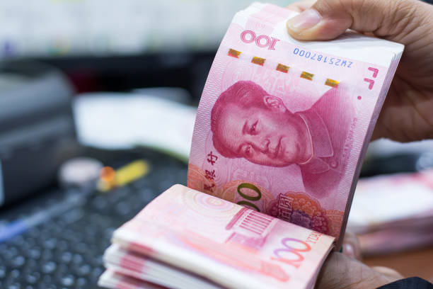 istock Chinese yuan money 1488839646