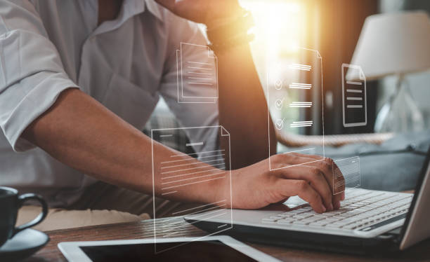 istock technology, checklist, contract, working, business, management, document, approval, inspections, career. businessman technology checklist and document approval inspections. checklist career contract. 1488843139