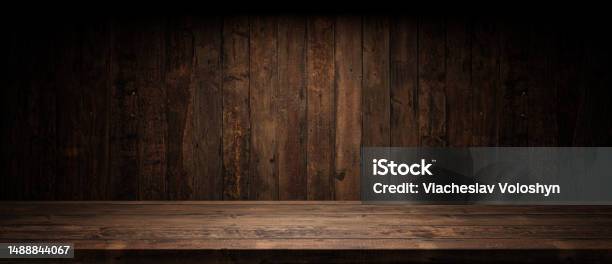Old Planks Wall And Table With Light Empty Space Vintage Wooden Background And Spotlight Showroom Stock Photo - Download Image Now