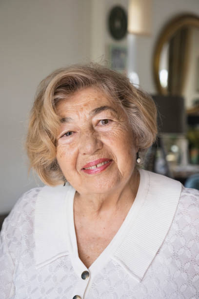 istock beatiful senior woman portrait 1488849356