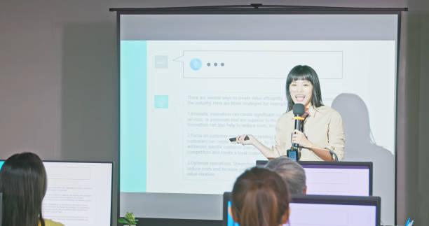 istock teacher in adult education class 1488852409