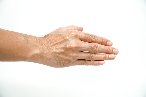 Man stretching his hand to shake hands isolated on white background,Human hand ready for alpha handshake.