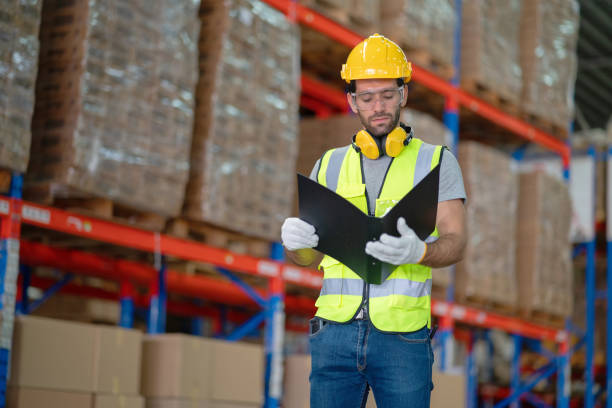 istock A male manager is checking inventory inside a warehouse. 1488866477